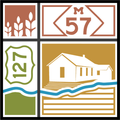 Illustrated emblem with highways, crops, and house scene.